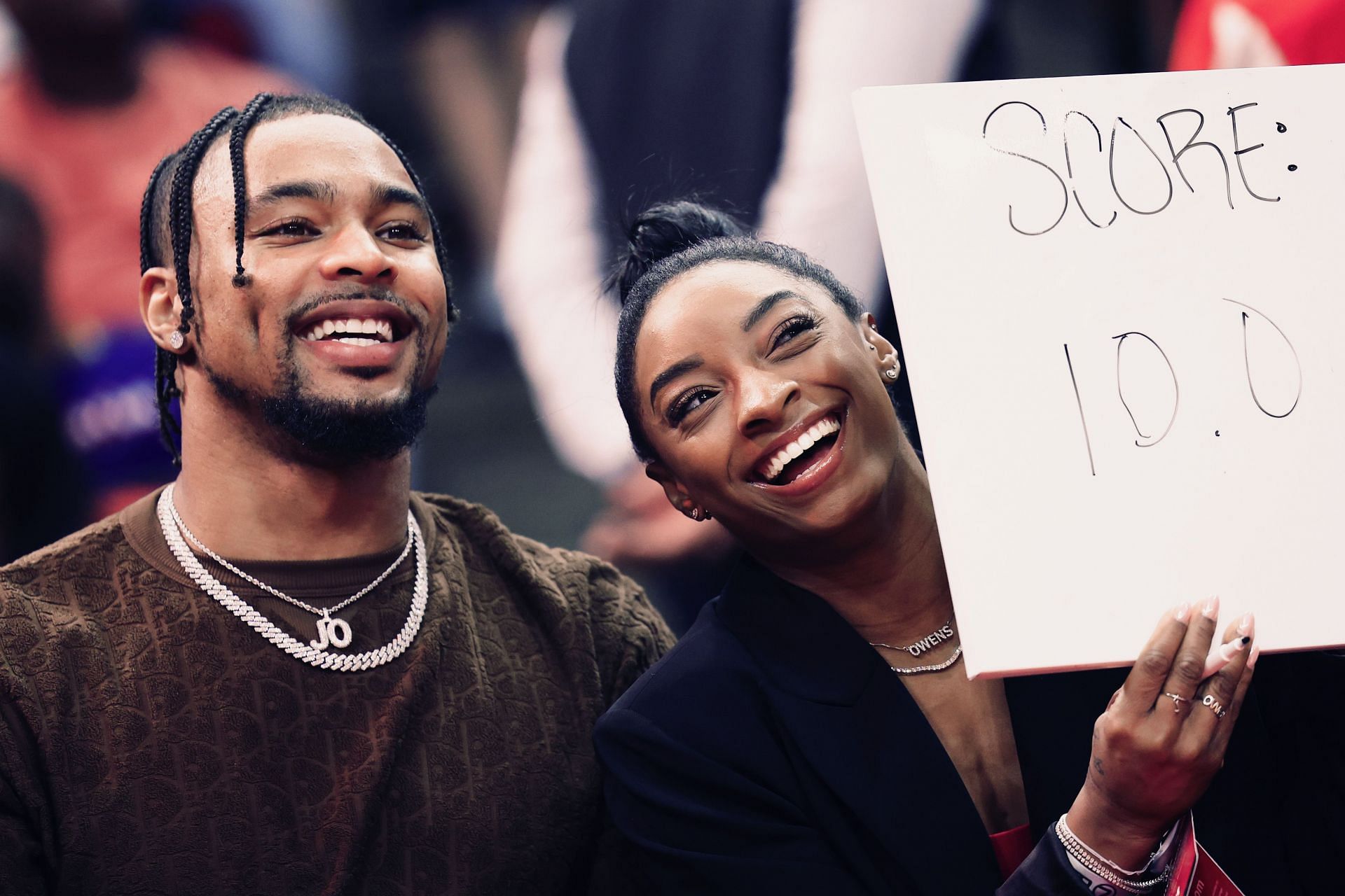 Simone Biles and Jonathan Owens attend a game in Houston, Texas. (Photo by Getty Images)